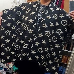 Black and cream poncho